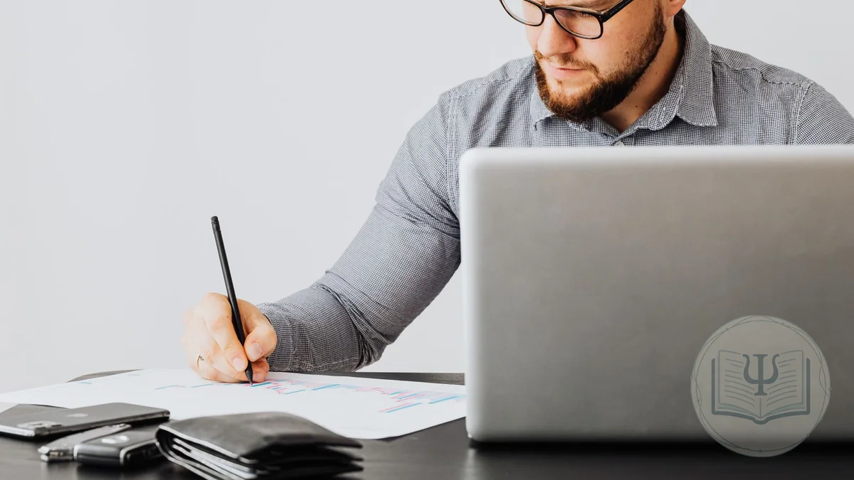 Forensic psychologist reviewing documents and taking notes for an expert report in a bright office