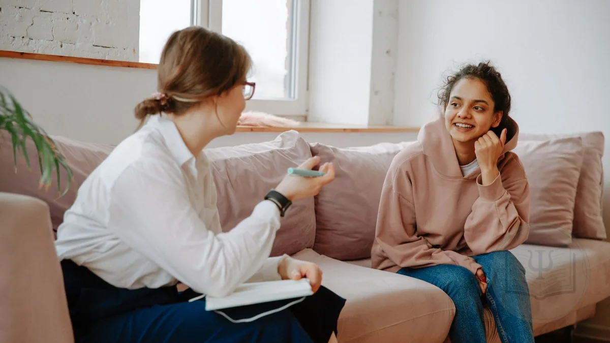 Psychologist supporting a patient during a therapy session for an eating disorder